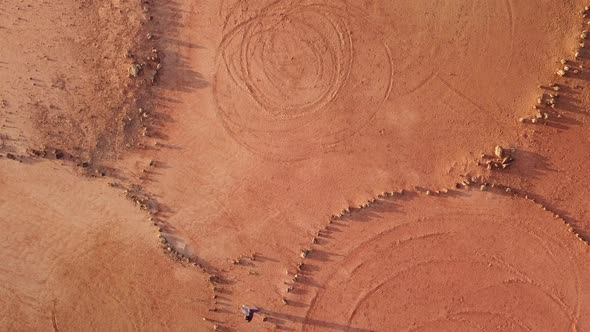 Man crosses walking aa big desert