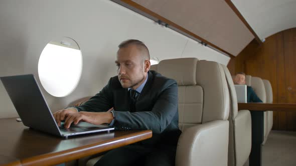 Successful Businessman Traveling on His Private Jet