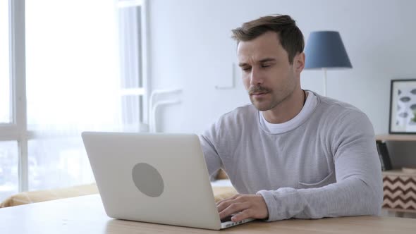 Penisve Adult Man Reading Book at Work