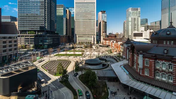 time lapse of Tokyo station, a railway station in the Marunouchi business district in Tokyo, Japan