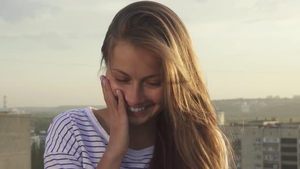 Happy Girl Smiling Looking at Camera