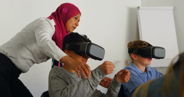Female pilot giving training on virtual reality headset to kids 4k