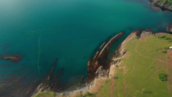 Drone flight around a picturesque rocky coastline