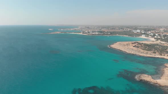 Beautiful turquoise waters of Ayia Nappa's Nissi beach - Cyprus Aerial view 4K