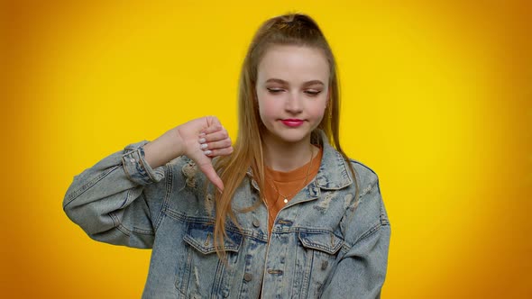 Upset Girl in Denim Jacket Showing Thumbs Down Sign Gesture Disapproval Dissatisfied Dislike