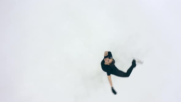 Top View of a Skating Rink with a Female Figure Skater