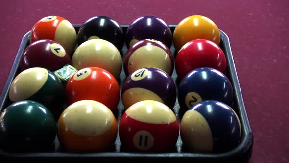 Billiard balls with numbers on a pool table
