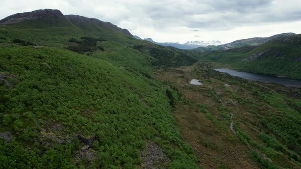 Aerial view of Norwegian landscape above mountains with scenic scenery