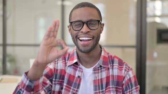 Portrait of African Man Showing Ok Sign with Finger