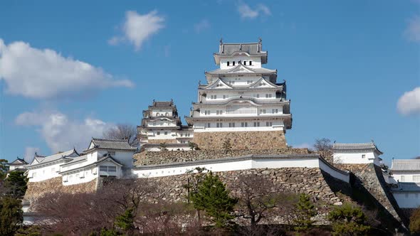 Himeji Castle Complex on Hill at Sunlight Timelapse