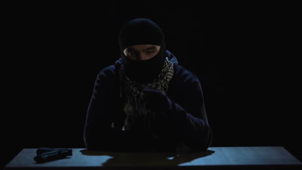 Terrorist Writing Video Message with Threats and Warnings, Global Attack