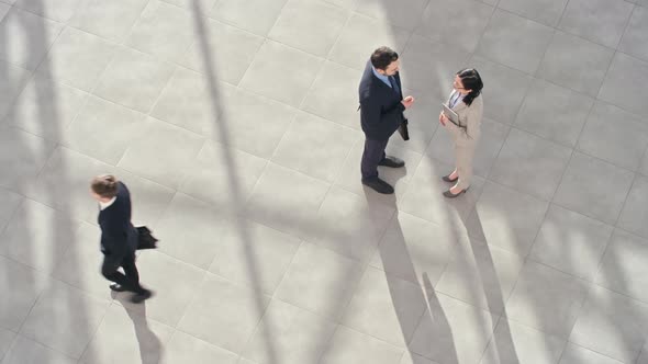 Businesspeople in office lobby