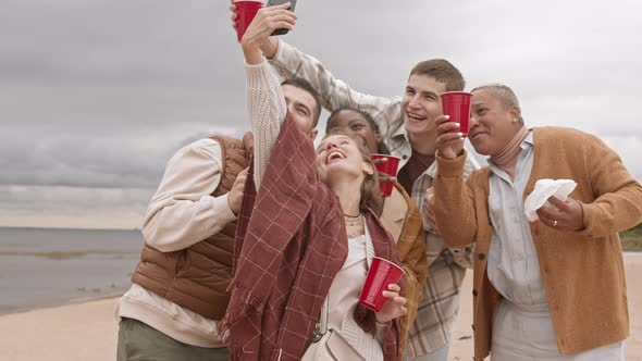 Friends Taking Selfie with Red Cups