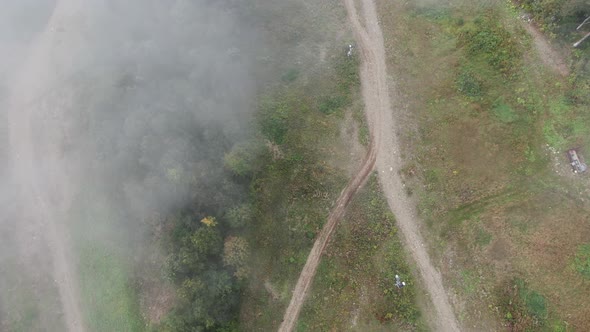 Drone descend from the sky thru clouds, Sochi, Russia