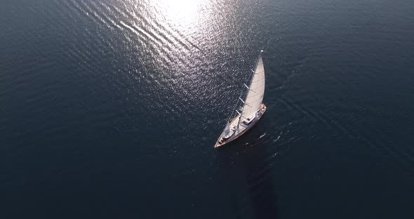 White Sailing Yacht Sails on the Sea Near Perast