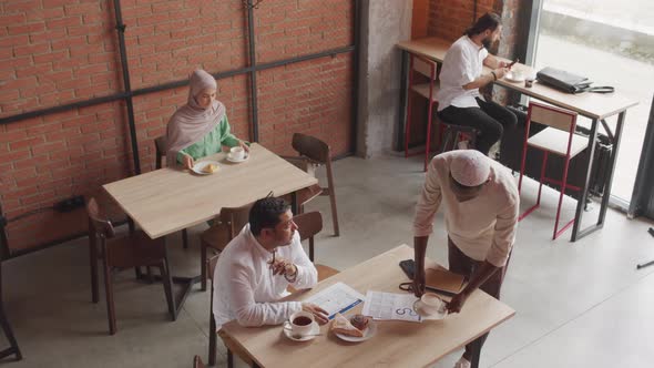 Diverse People in Cafe in Morning