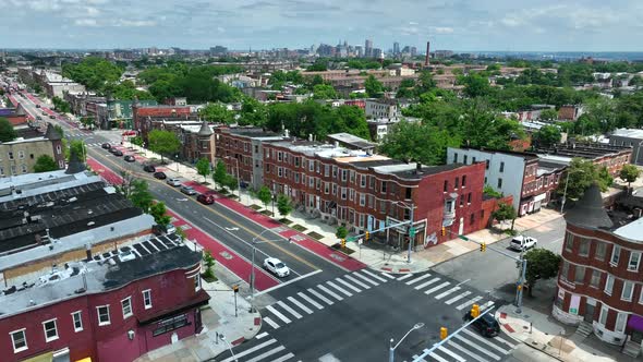 Inner city homes and apartment buildings in American city. Residential houses and rowhomes. Urban ci