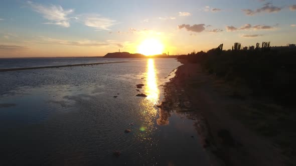 Sunset Over the Sea Coast