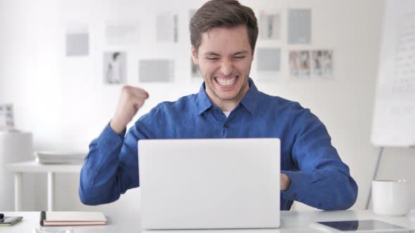 Excited Casual Adult Man Celebrating Success