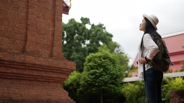 Woman visiting ancient temple