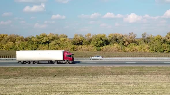 White High Speed Truck on Highway