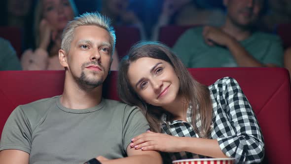 Happy Couple Watching Romantic Film Hugging Feeling Love at Movie Theater Enjoying Date at Cinema