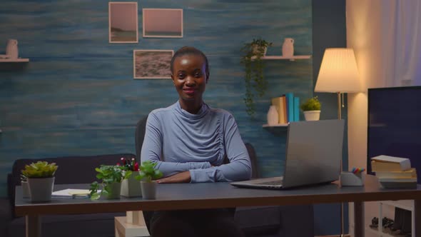 Portrait of Black Woman Looking at Camera Smiling