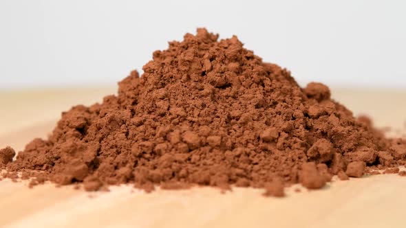 Pile of cocoa powder rotating