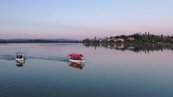 Fishing boat on lake at sunset golyazi, bursa turkey