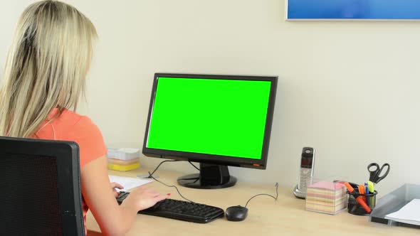 Young Attractive Woman Working on the Desktop Computer in the Office - Green Screen
