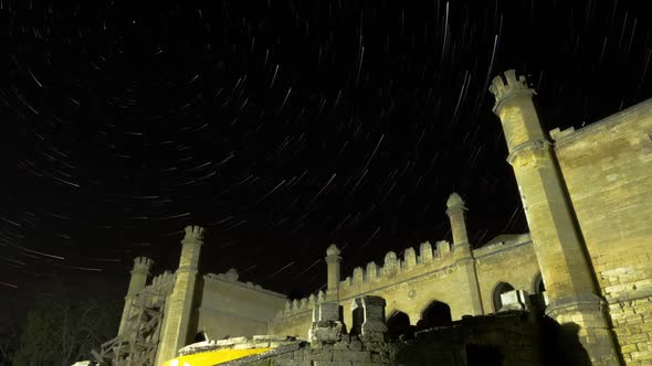 Star Trails Over Scenic Abandoned Ruin of Building