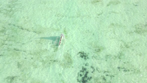 Aerial View of a Boat in the Ocean Near the Coast of Zanzibar Tanzania