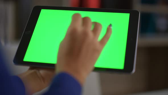 African American Woman Hands Using Tablet Information Green Screen in Office