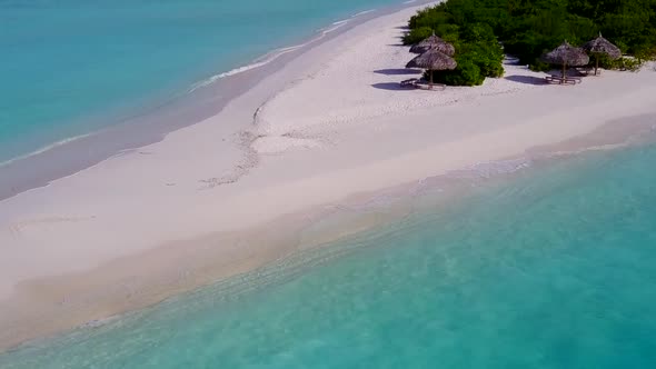 Drone aerial landscape of island beach by blue lagoon and sand background