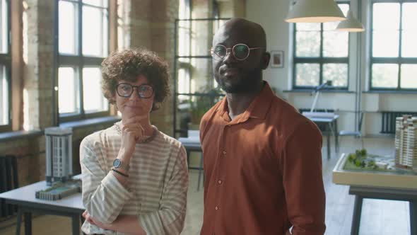 Portrait of Two Multiethnic Architects in Office