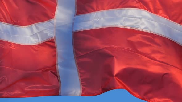 The national danish flag waving in the wind.