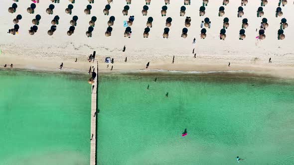 Static aerial drone footage of the beach front on the Spanish island Majorca Mallorca, Spain