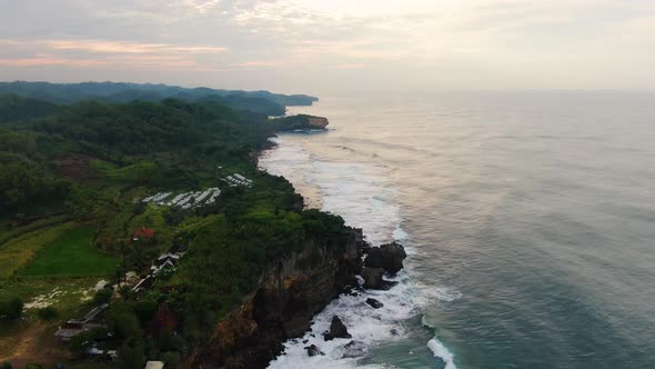 Aerial view on cliffs on southern shore of Java Island, Indonesia at sunset