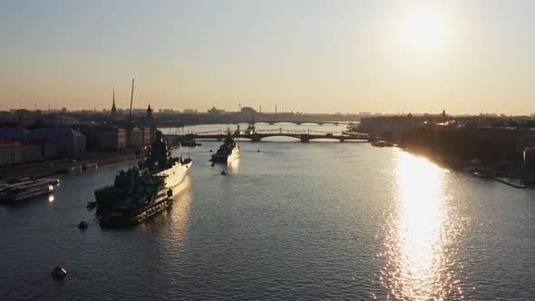 Aerial Morning Cityscape with Warships in the Waters of the Neva River Before the Holiday of the