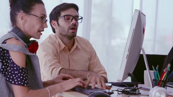 Creative Business People Group Having Conversation at Office Desk in Workplace