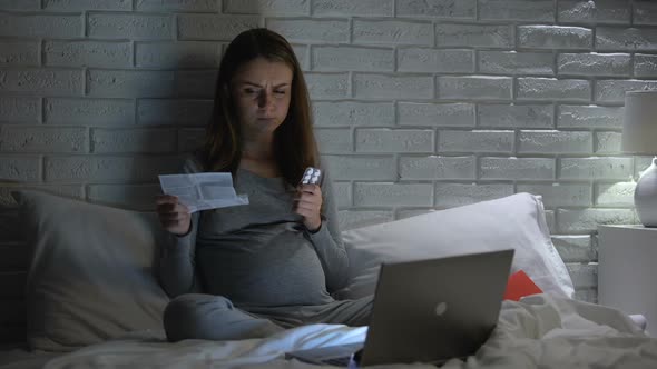 Pregnant Woman Reading Pills Instruction, Thinking Over Side Effects for Fetus