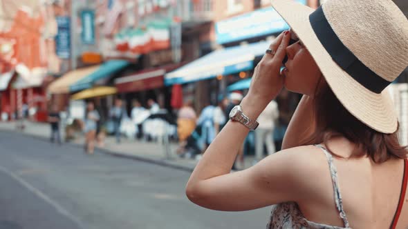 A young girl takes pictures 