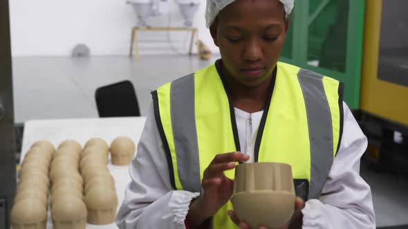 Warehouse female worker working in factory