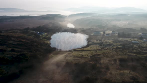 Beautiful Sunrise Above Peatbog in County Donegal with Fog  Ireland