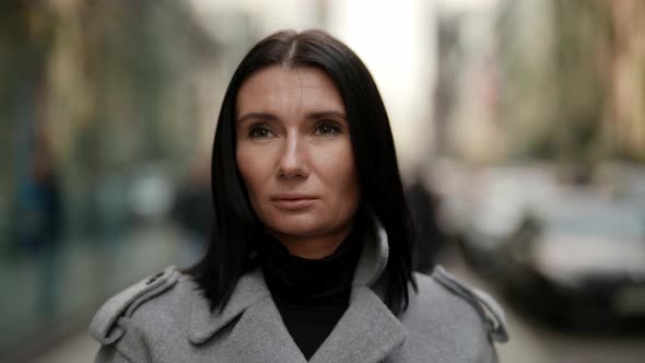 Portrait of Middleaged Elegant Lady on Street in City Center Closeup of Face