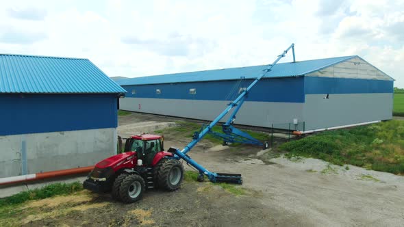 Warehouse Facilities in the Wheat Fields Heavy Machinery Film Grain