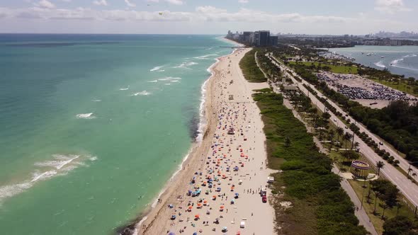 Aerial Video Crowded Spring Break Beach Scene Miami 2021