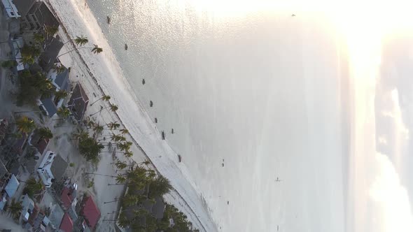 Vertical Video of the Ocean Near the Coast of Zanzibar Tanzania Aerial View