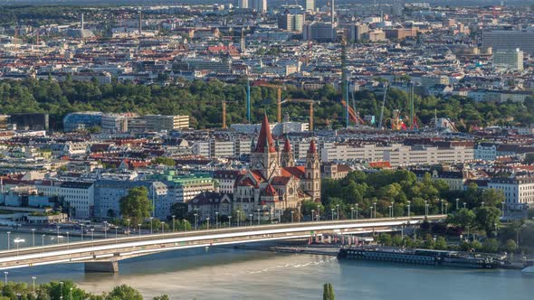Aerial Panoramic View of Vienna City with Skyscrapers Historic Buildings and a Riverside Promenade