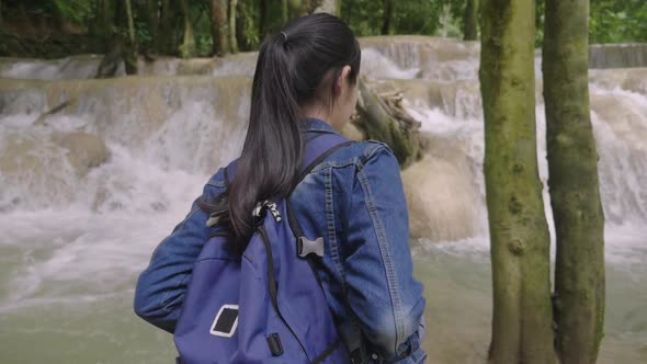 Girl Hiker Walking At Waterfall